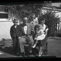 Portrait of a family in a backyard