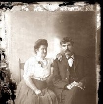 Unknown man and woman pose for their portrait