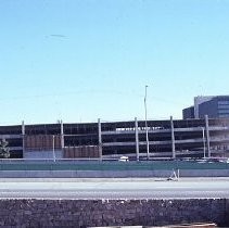 Site of the Downtown Plaza Parking Garage, Lot "G" near Macy's Department Store, 4th, 5th K and L Streets under construction. This view is looking east from the Fratt Building in Old Sacramento