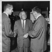 Douglas Dempster, Postmaster General, Arthur E. Summerfield, and Edward A. Combatalade as they gather to commemorate the centennial of the Pony Express in 1960