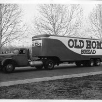 Close-up view of a Feeder Truck for Old Home and Betsy Ross Bread for Pioneer Baking Company