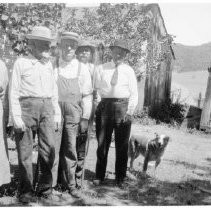 Unknown family in front of home