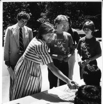 Andrea Hart, daughter of Democratic presidential candidate Gary Hart, campaigning at UC Davis, stops by the Hart for President table in the UCD quad