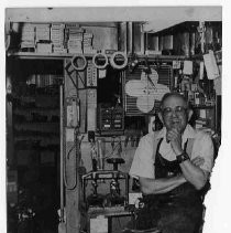 Tosh Matsuoka in Mat's Shoe Service shop