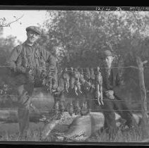 Two men with dead game birds