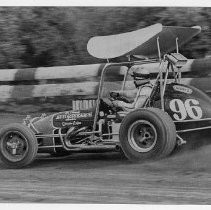 Jimmy Gordon wheels his Chevy-powered caged sprint car through a turn ...