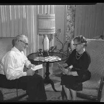 A couple looking at brochures