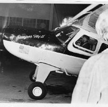 Dr. Alvin Marks, pilot and owner of Skymark Airlines. Here, his plane, the Semper Fly II