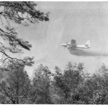 Bomber Drops Fire Retardant
