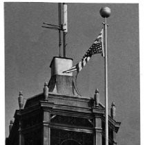 View of top of Elks Temple with American flag flying upside down