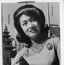 Josie Leong, Miss Chinatown USA, with a Chinese pagoda in the background