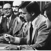 Gov Brown signing papers