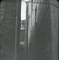 Views of redevelopment sites, renderings, and table models for the proposed Redevelopment District. Includes maps and site plans. This view is a street scene at 425 K Street in the rear