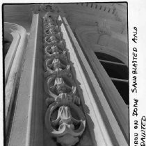View of the cast iron decorations on the California State Capitol dome after being sandblasted and painted during the restoration project