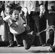 Caption reads: "Lee Giudici with his entry 'E Lucky Leaper' which jumped 15 feet, 11 3/4 inches. Lee's jump was not measured" in Calaveras County Frog Jump