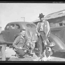 Two men with dead game birds