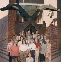 Staff photo in front of dredger