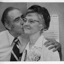 Ella Hertzog, librarian at Sylvan Intermediate School in Citrus Heights, at her surprise retirement party, learns the library will be renamed The Ella Hertzog Media Center. Embracing her is Principal Robert Fries