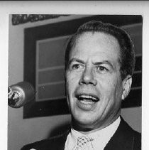 Thomas H. Kuchel, the moderate Republican U.S. Senator from California (1953-1969), at microphone, gesturing