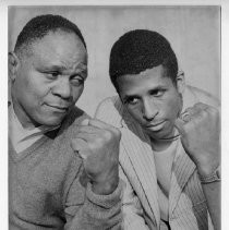 Championship middleweight boxer Lloyd Marshall Sr., left, with his son Lloyd Marshall Jr