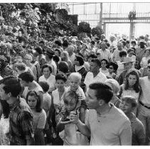 View of the Hall of Flowers and the crowd at the California State Fair. This was the last fair held at the old fair grounds