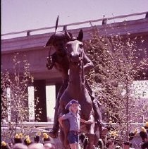 Old Sacramento. View of the Pony Express Statue site at 2nd and J Streets. View shows the site and installation of the statue. Crowd gathers during dedication