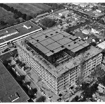 Aerial view of the new California State Department of Motor Vehicles under construction on Broadway and 24th Street in 1961