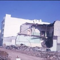 Views of redevelopment sites showing the demolition of buildings in the district. These views date from 1959 to 1964. Specific sites are not identified in this set of images