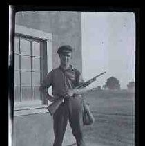 Man with gun and game bag