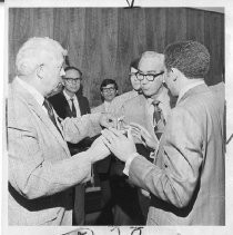 Richard H. Marriott, Mayor of Sacramento, 1968-1975. Here, Mayor Marriott (center) with a group of men, including opponent Milton McGhee (right, back to camera)