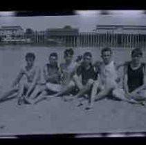 Young men swimming