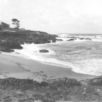 Surf washes sandy beach