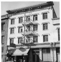 The Latham Building, with sign for Welcome Hotel