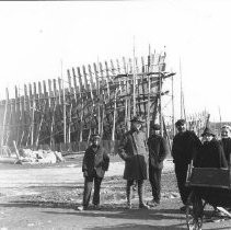 A soldier at a shipyard