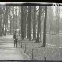 Unidentified soldier walking in a park in Bois de Vincennes, France