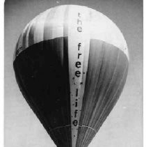 Pamela Brown, and Malcolm Brighton wave as their 80-foot high balloon