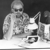 Man Seated at Desk