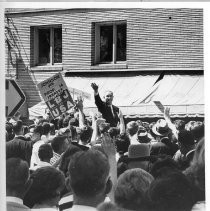 President Lyndon B. Johnson, on a campaign visit to Sacramento, waves to the crowd at 11th and K Streets