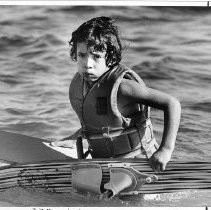 Josh Garcia. Young boy after waterskiing on Folsom Lake on New Year's Day for Polar Bear Day