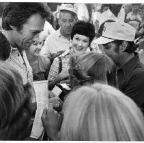 Clint Eastwood signs autographs for fans at the Del Paso Country Club after golf