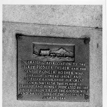 Close-up view of the bronze plaque located on the west entrance of the California State Capitol building donated by the Native Daughters and Sons of the Golden West