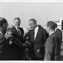 President Lyndon B. Johnson on a campaign visit to the Sacramento area, greeting people after coming off Air Force One