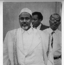 Sultan Ali Mirah Hanfere, followed by aides. The Ethiopian leader was forced to flee the country after a coup overthrew Emperor Haile Selassie