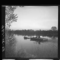 Barge being towed