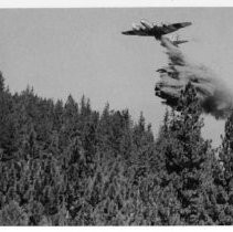 Plane Drops Fire Retardant