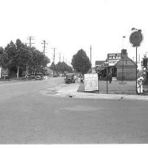 The Chris Pulon grocery store is seen in the background at 1616 Y Street and a Shell Service Station at the corner