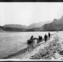 "Party reembarking after hike across sand bar at Las Vegas Wash between Boulder and Black Canyons."