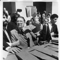 Howard Jarvis, businessman, lobbyist and anti-tax advocate behind Proposition 13, shown here with boxes of letters supporting Prop 13 at a Capitol news conference