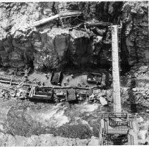Workmen prepare the bottom of Box Canyon for diversion pipelines and concrete pouring at the base of the Box Canyon Dam site