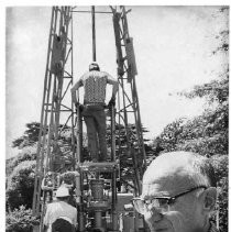 Engineering geologist Nick Silken inspects a soil sample pulled up by the drill. Crews are studying the ground around the California State Capitol during the restoration project